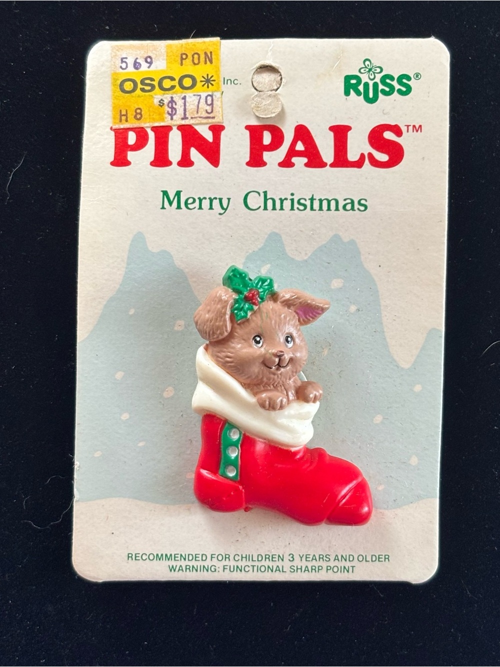 Russ Brown Puppy in Red Christmas Stocking Pin with Green Holly